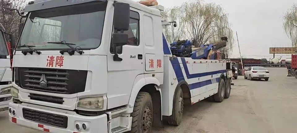 4x2/6x2/6x4/8x4/8x6/4x4/6x6 Driving Type Wrecker Truck with High Power